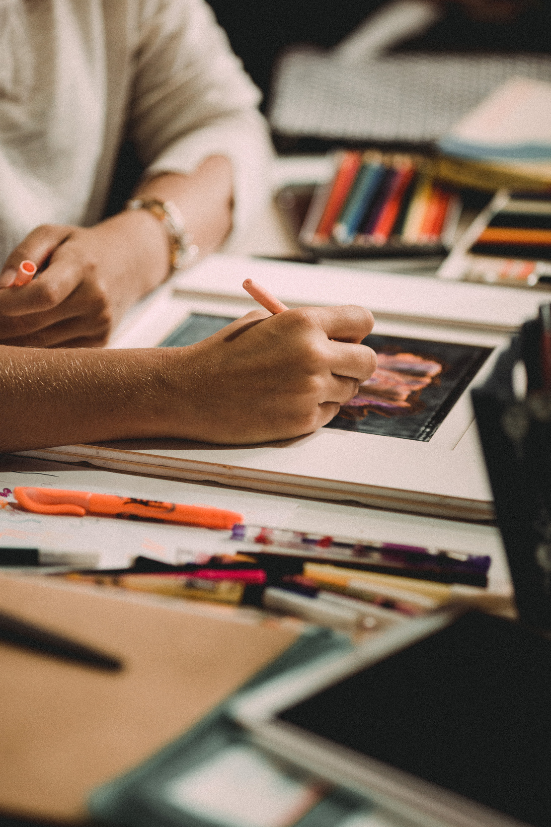 Professional artist drawing difficult picture in frame